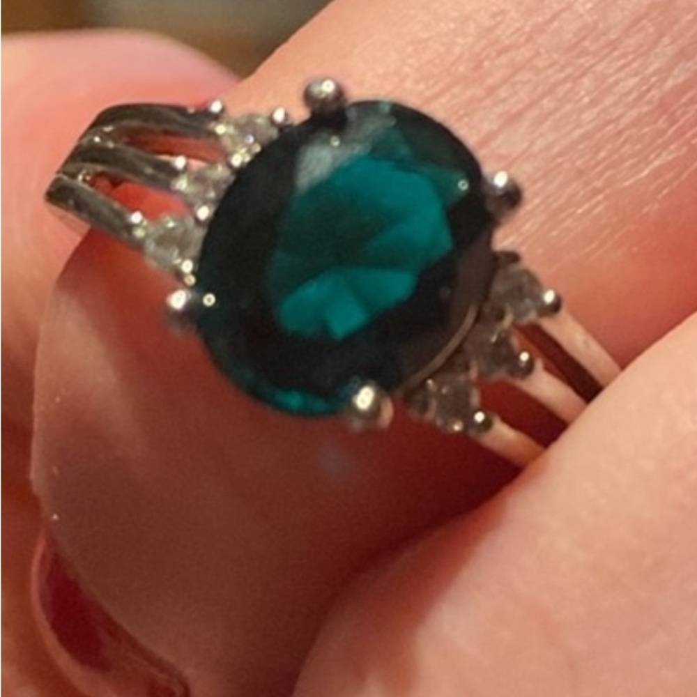 - Size 8 green filled topaz  ring